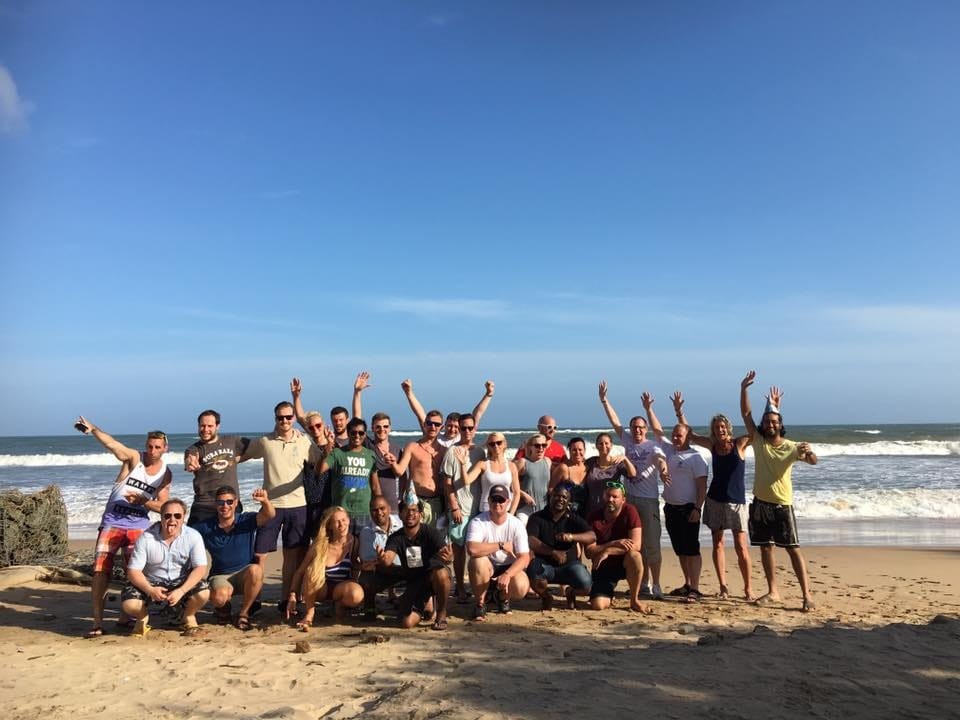 Friends gathered on a Sri Lankan beach